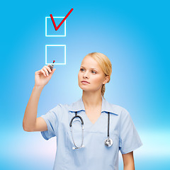 Image showing doctor or nurse working with something imaginary