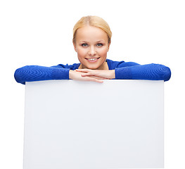 Image showing woman in casual clothes with blank white board