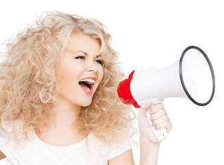 Image showing woman with long curly hair holding megaphone