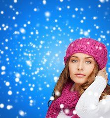 Image showing woman in pink hat and scarf