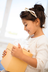 Image showing happy child with gift box