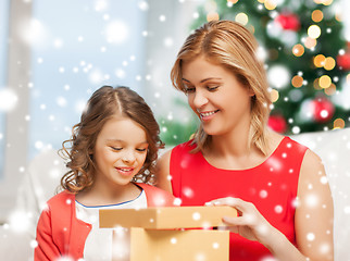 Image showing happy mother and child girl with gift box