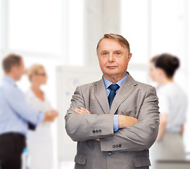 Image showing serious businessman or teacher in suit