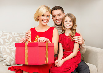 Image showing happy family opening gift box