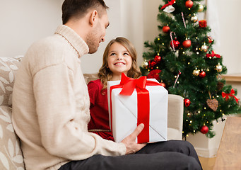 Image showing smiling father and daughter looking at each other