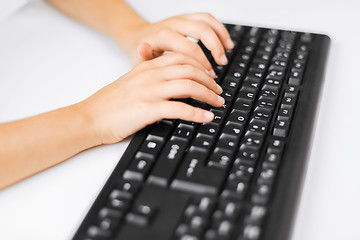 Image showing student girls hands typing on keyboard