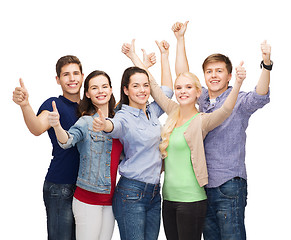 Image showing group of smiling students showing thumbs up