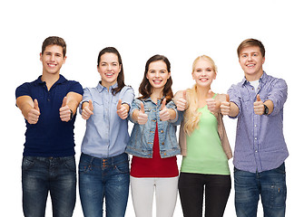 Image showing group of smiling students showing thumbs up