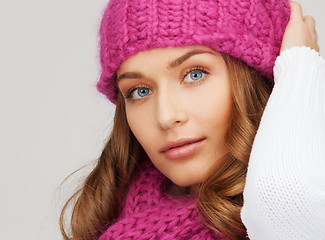 Image showing woman in pink hat and scarf