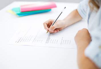 Image showing little girl taking test