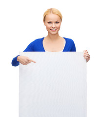 Image showing woman in casual clothes with blank white board