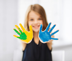 Image showing girl showing painted hands