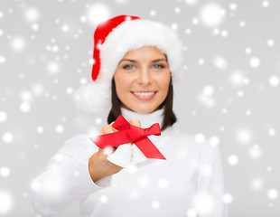 Image showing woman in santa helper hat with jingle bells