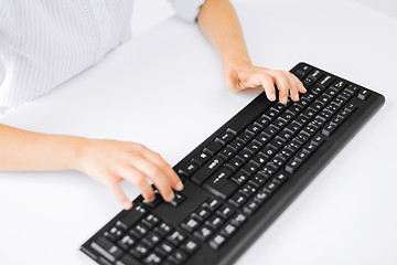 Image showing student girls hands typing on keyboard