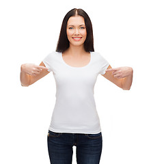 Image showing smiling woman in blank white t-shirt