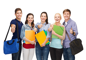 Image showing group of smiling students showing thumbs up