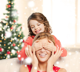 Image showing mother and daughter making a joke