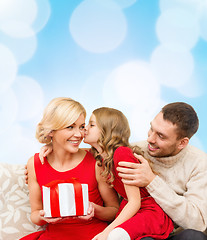 Image showing adorable child kisses her mother