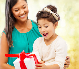 Image showing happy mother and child girl with gift box