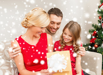 Image showing happy family opening gift box