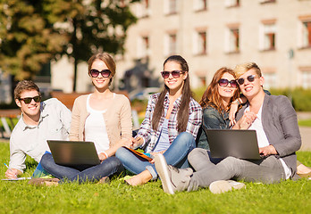 Image showing students or teenagers with laptop computers