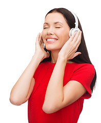 Image showing smiling woman with headphones