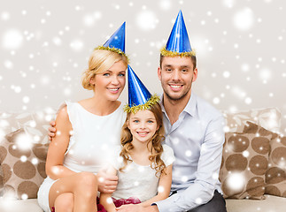 Image showing happy family in hats celebrating