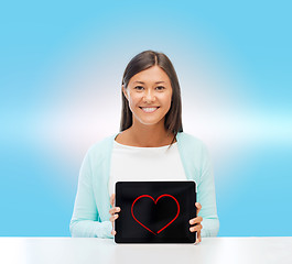 Image showing smiling woman with tablet pc