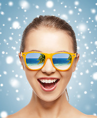 Image showing happy screaming teenage girl in shades