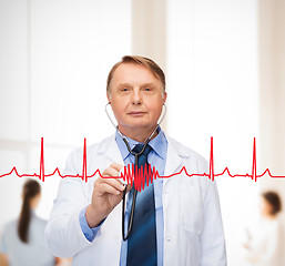 Image showing smiling doctor or professor with stethoscope