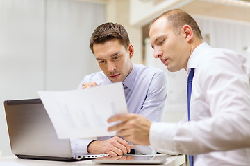Image showing two businessmen having discussion in office