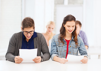 Image showing two teenagers looking at test or exam results