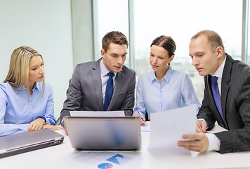 Image showing business team with laptop having discussion