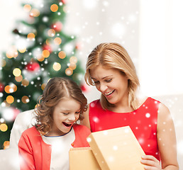 Image showing happy mother and child girl with gift box