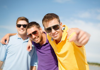 Image showing group of friends having fun on the beach