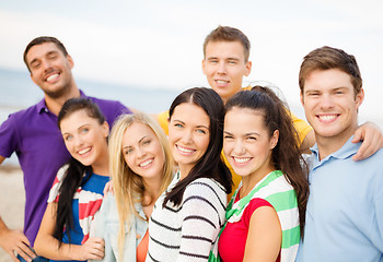 Image showing group of friends having fun on the beach