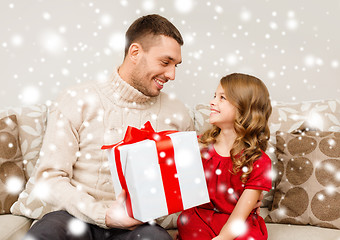 Image showing smiling father and daughter looking at each other