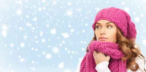 Image showing beautiful woman in pink winter hat and muffler