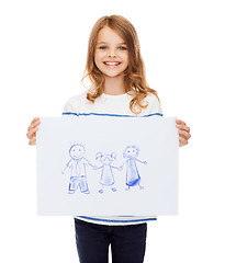 Image showing smiling little child holding picture of family