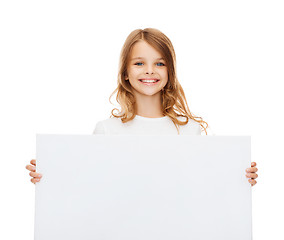 Image showing smiling little girl with blank white board