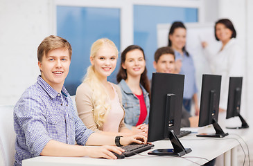 Image showing students with computer monitor at school
