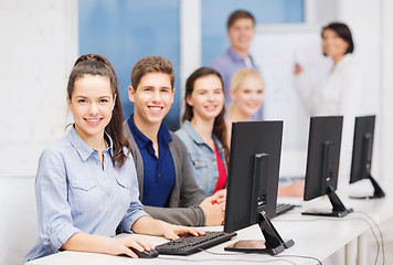 Image showing students with computer monitor at school