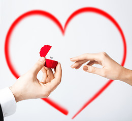 Image showing couple with wedding ring and gift box