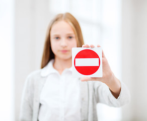 Image showing girl showing no entry sign