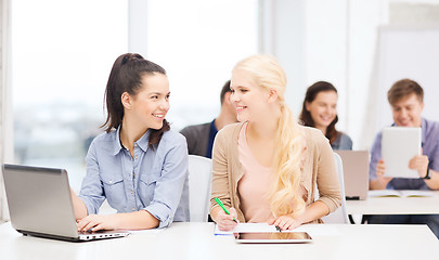 Image showing students with laptop, tablet pc and notebooks