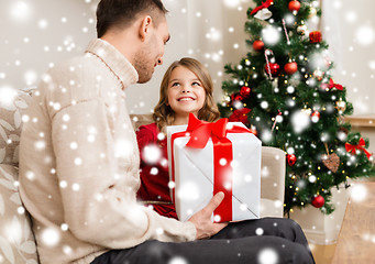 Image showing smiling father and daughter looking at each other