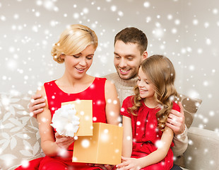 Image showing happy family opening gift box