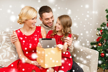 Image showing smiling family with tablet pc