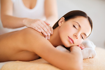 Image showing beautiful woman in spa having massage
