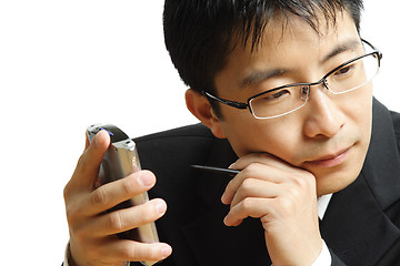 Image showing Working businessman